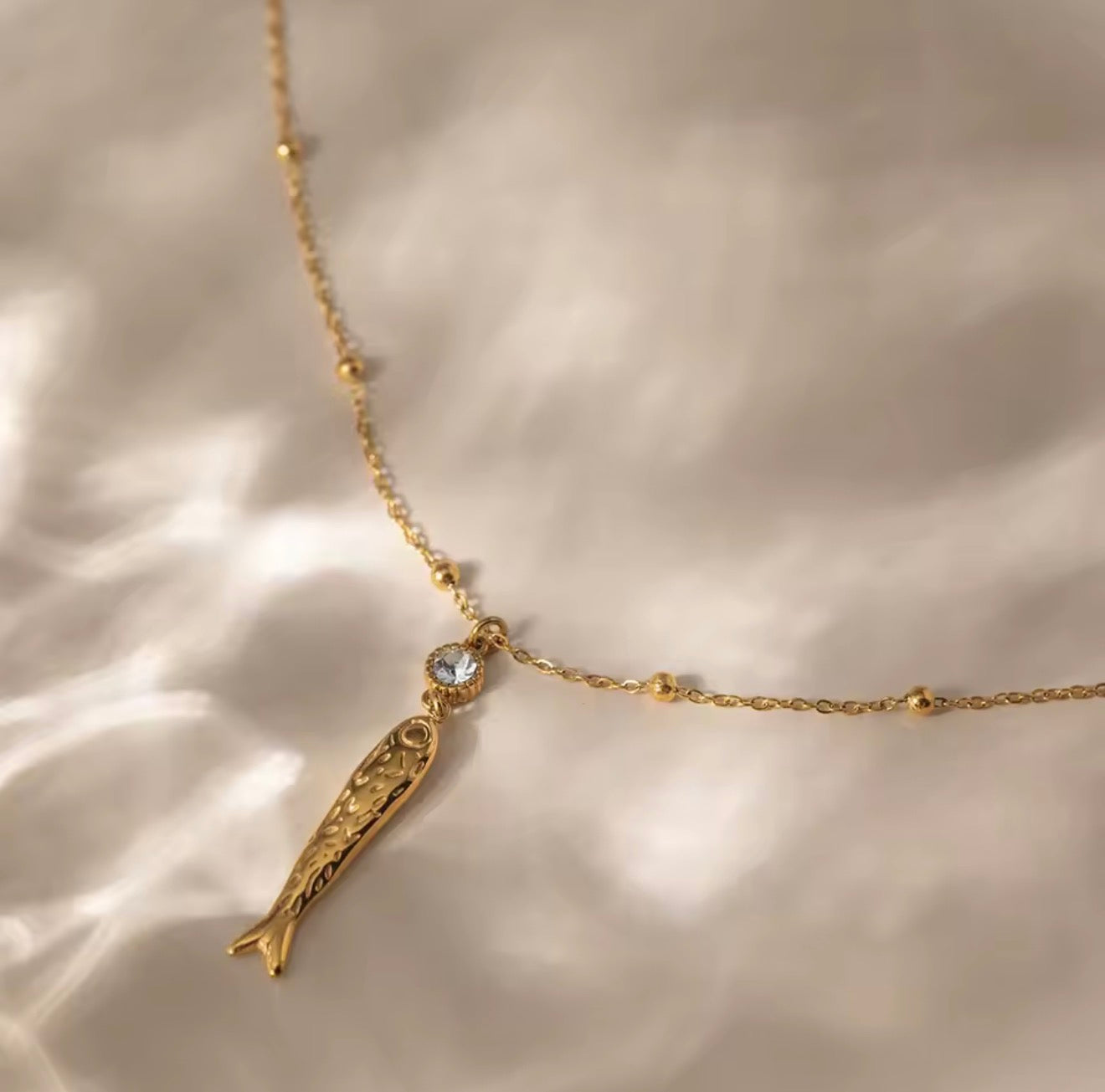 CAUGHT ONE NECKLACE