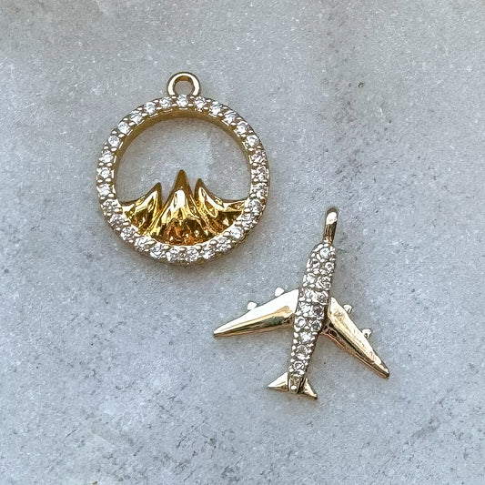 TRAVELER CHARM