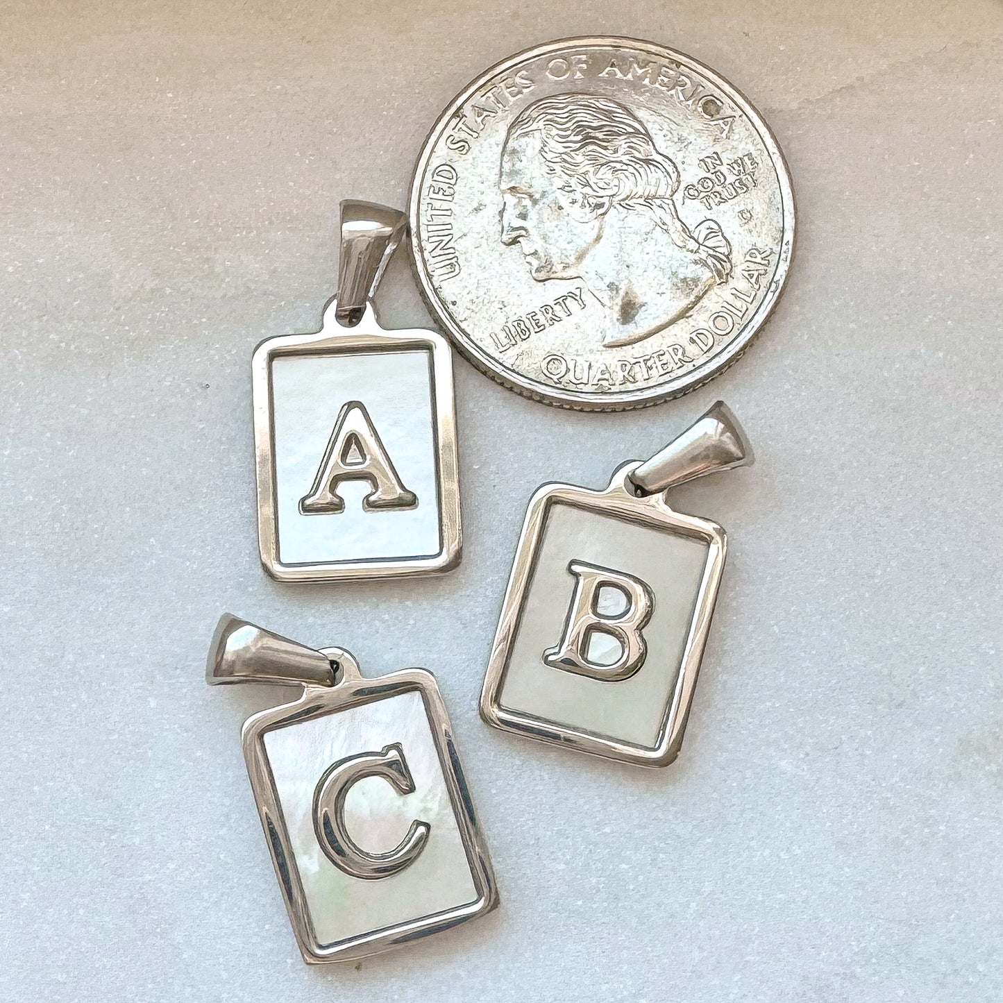 SILVER INITIAL CHARM