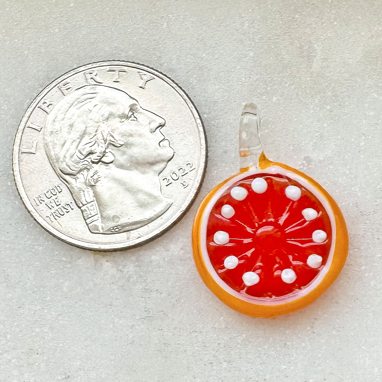 ORANGE GLASS CHARM